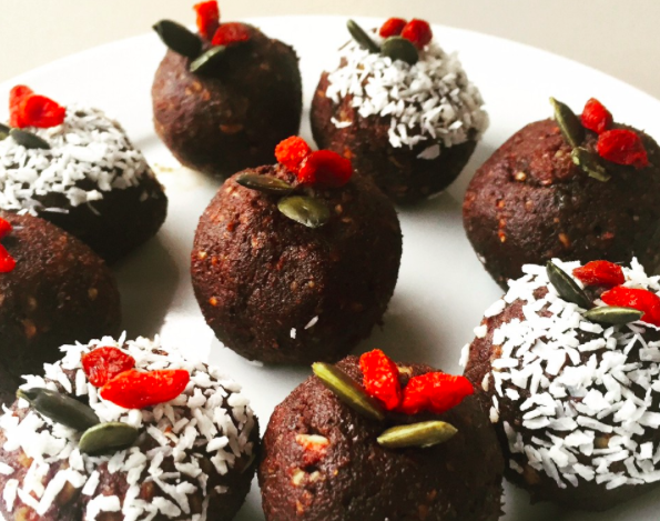 Chocolate bliss balls with coconut coating